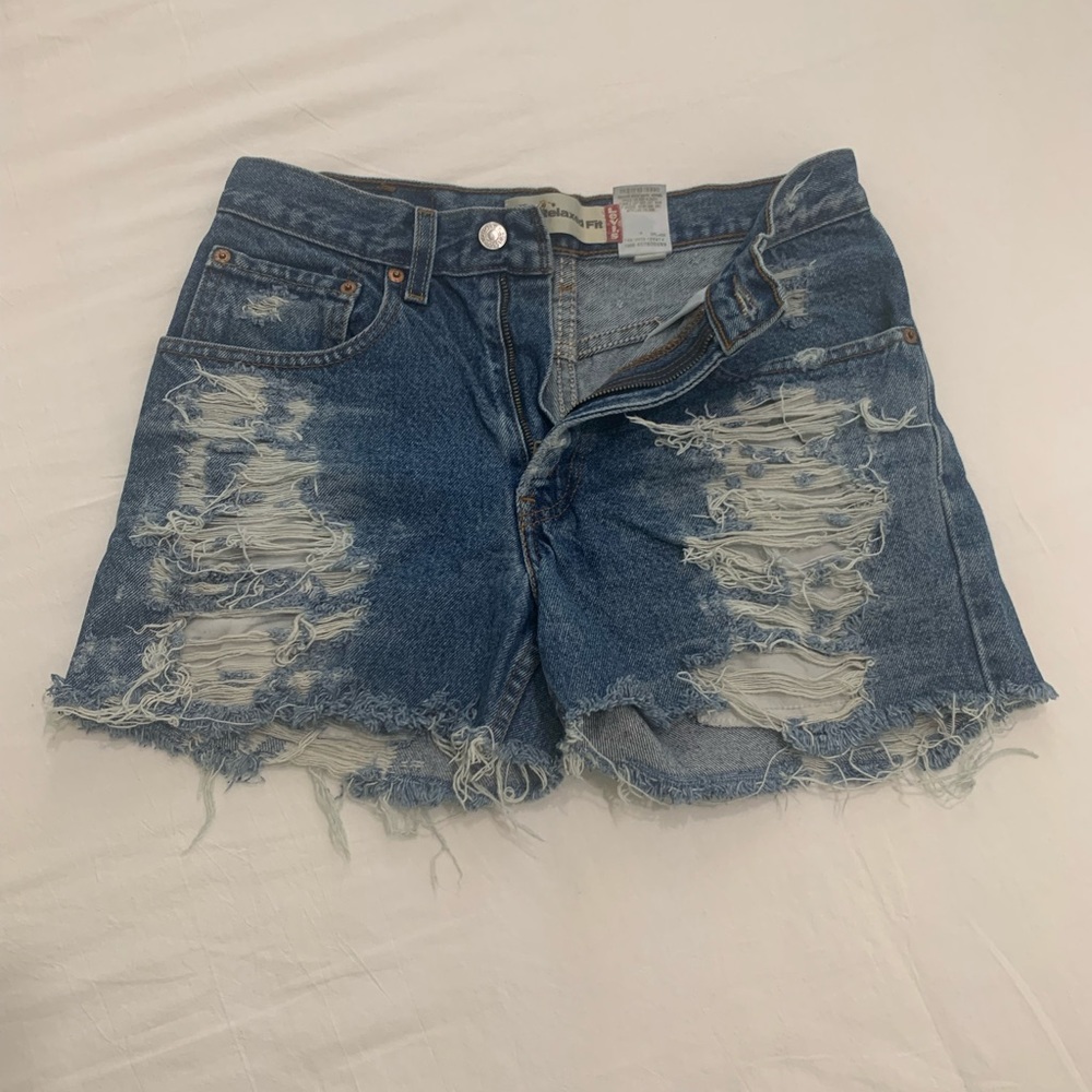 High waisted Levi’s 550 shirts distressed